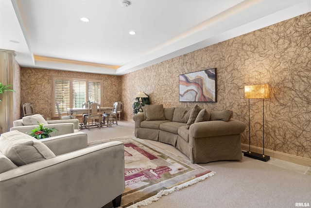 200 W Ravinwoods Rd, Peoria, IL 61615 - carpeted living area with wallpapered walls, a raised ceiling, recessed lighting, and baseboards