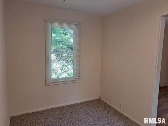 view of carpeted spare room