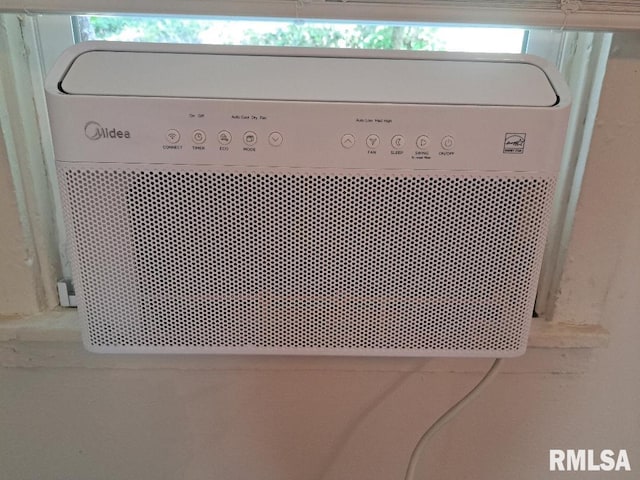 interior details featuring a wall unit AC