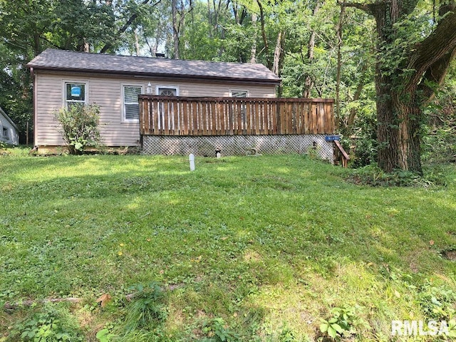 view of yard with a deck