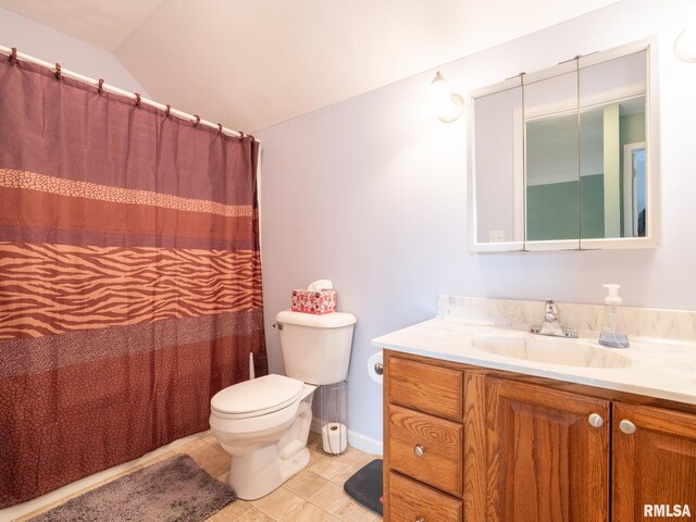 bathroom featuring tile patterned flooring, vaulted ceiling, walk in shower, toilet, and vanity