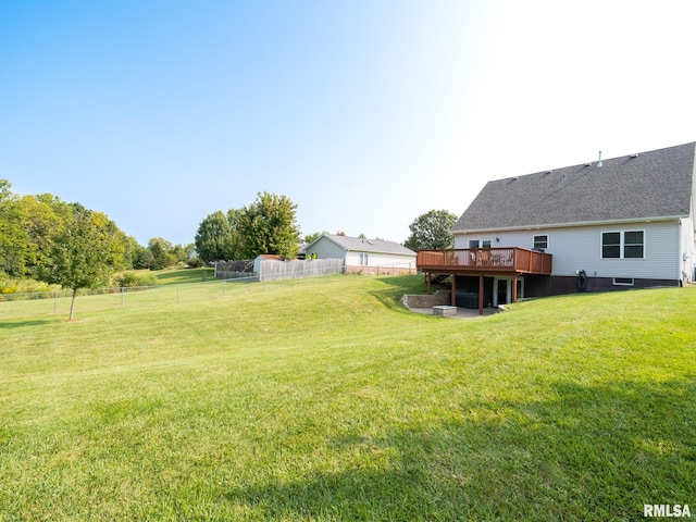 view of yard featuring a wooden deck