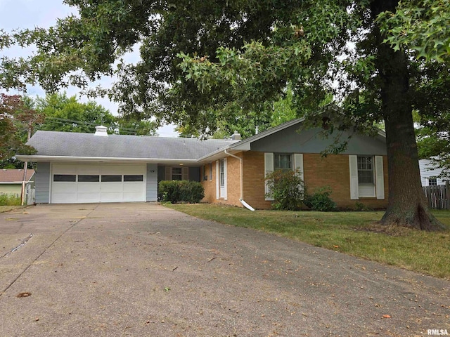 ranch-style home with a garage