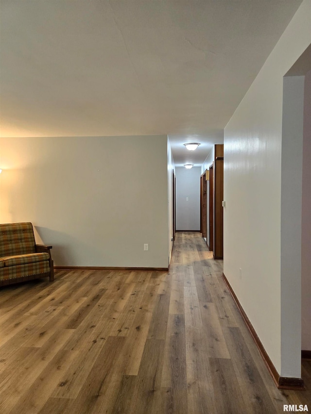 hall with light wood-type flooring