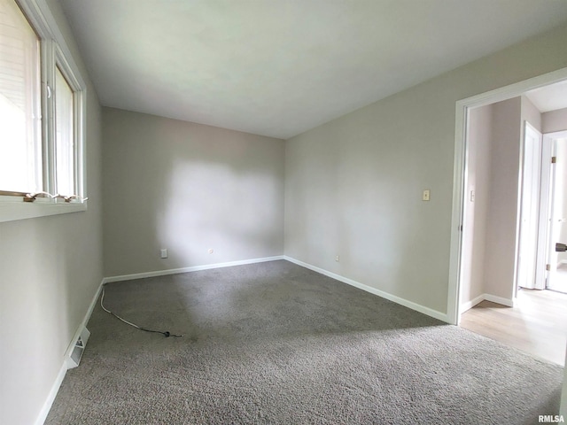 view of carpeted spare room