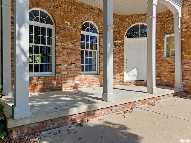 entrance to property with covered porch