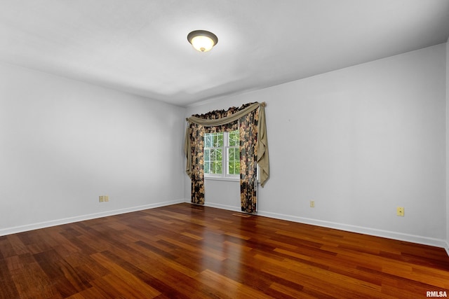 empty room featuring hardwood / wood-style floors