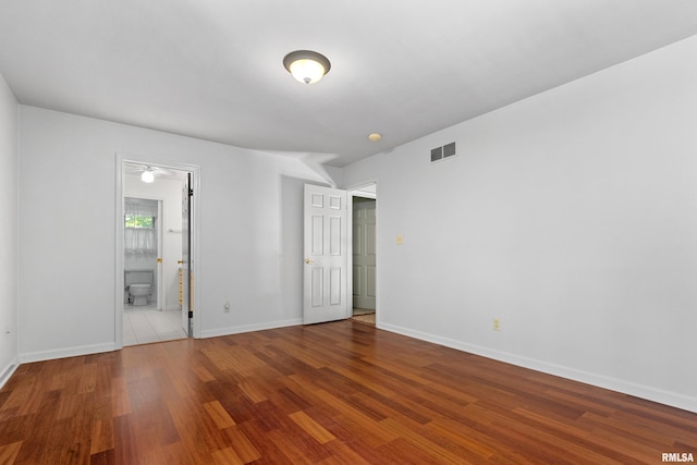 spare room with light hardwood / wood-style flooring