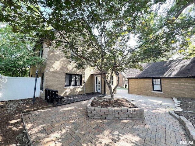 rear view of property with a patio