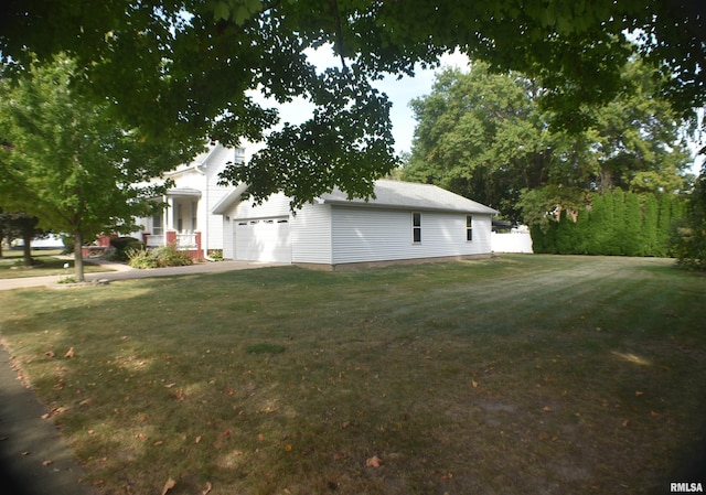 view of yard with a garage