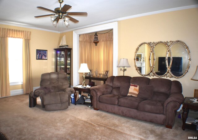 carpeted living room featuring ceiling fan and crown molding