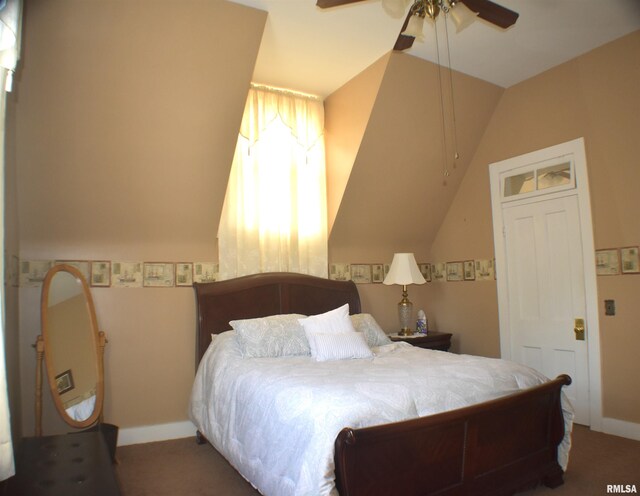 bedroom with lofted ceiling, ceiling fan, and carpet flooring