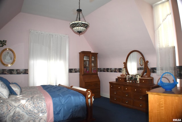 bedroom with vaulted ceiling