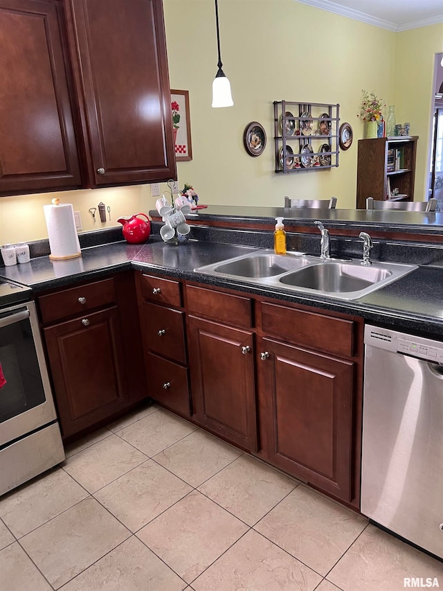 kitchen featuring hanging light fixtures, light tile patterned floors, sink, ornamental molding, and appliances with stainless steel finishes