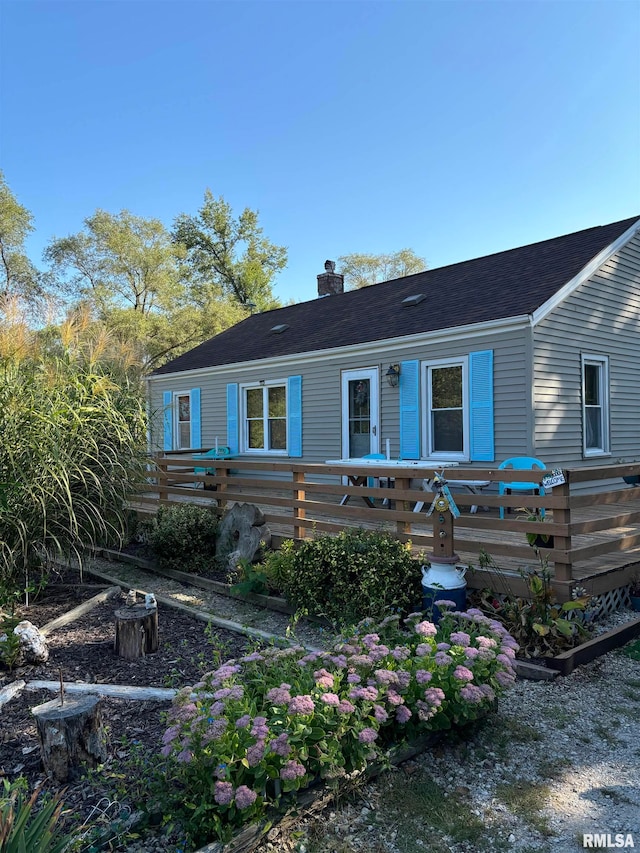 view of front of house featuring a wooden deck