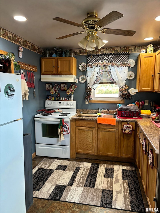 kitchen with ceiling fan and white appliances