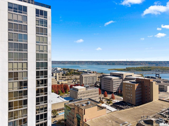 property's view of city with a water view