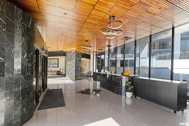 125 SW Jefferson St Unit W-5C, Peoria, IL 61602 - common area featuring a wall of windows