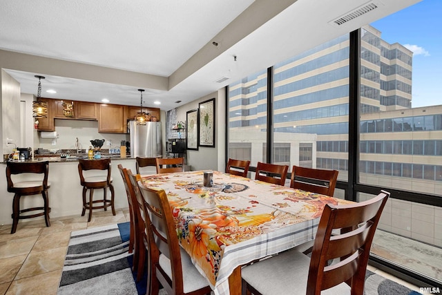 125 SW Jefferson St Unit W-5C, Peoria, IL 61602 - dining space featuring recessed lighting