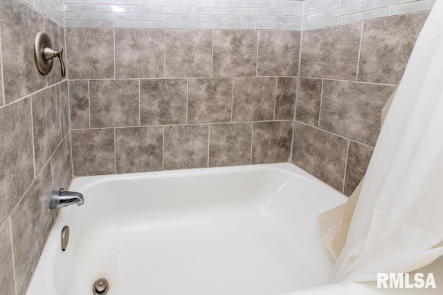 bathroom featuring a tub to relax in