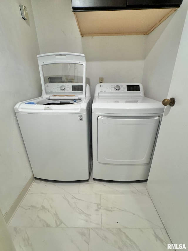 laundry room featuring independent washer and dryer