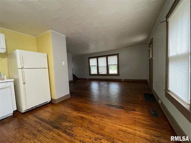 unfurnished living room with dark hardwood / wood-style flooring