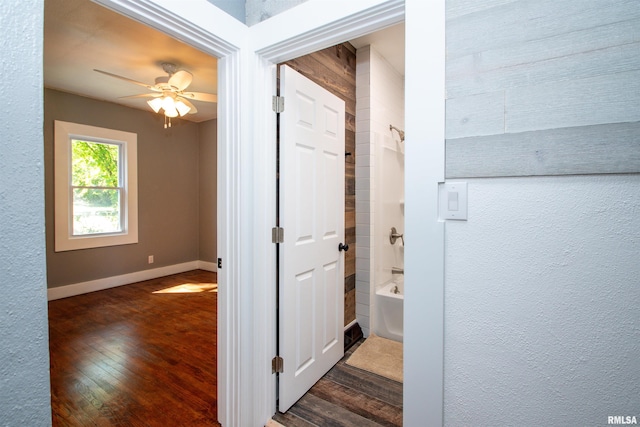 hallway featuring dark wood-type flooring