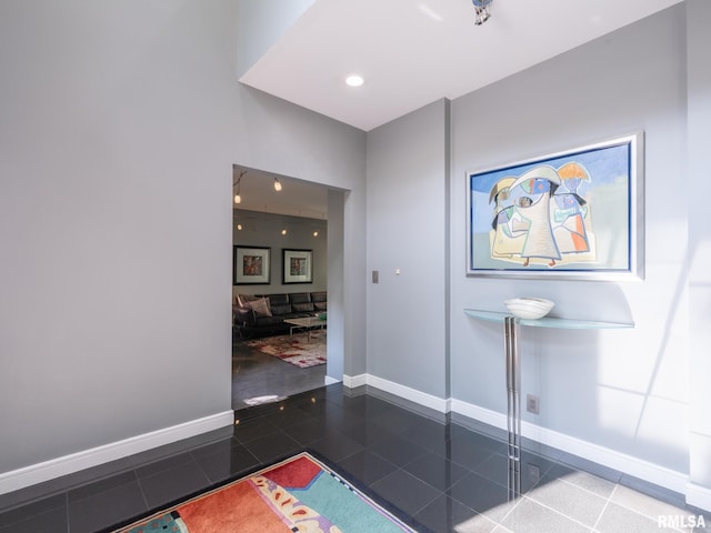 interior space featuring dark tile patterned floors