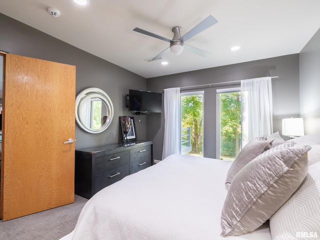 bedroom with light colored carpet and ceiling fan