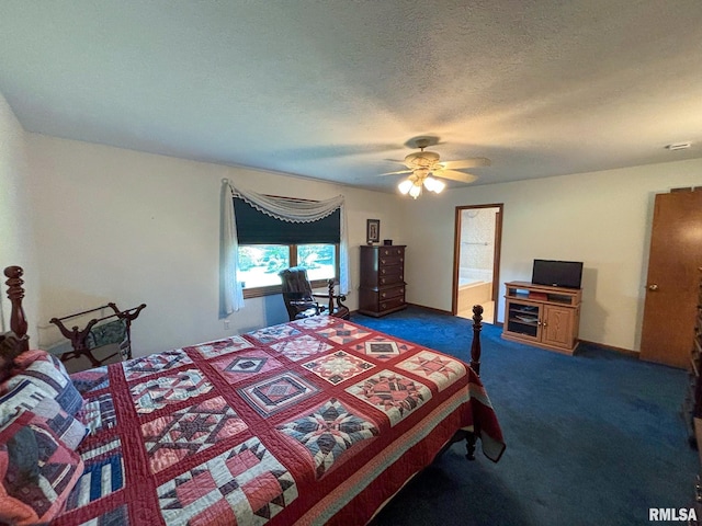 bedroom featuring dark colored carpet, ceiling fan, and a textured ceiling