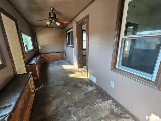 interior space featuring ceiling fan