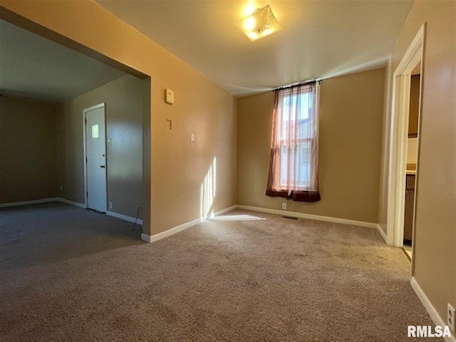 view of carpeted spare room