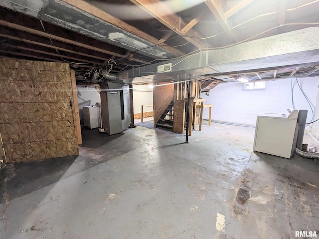 basement featuring separate washer and dryer