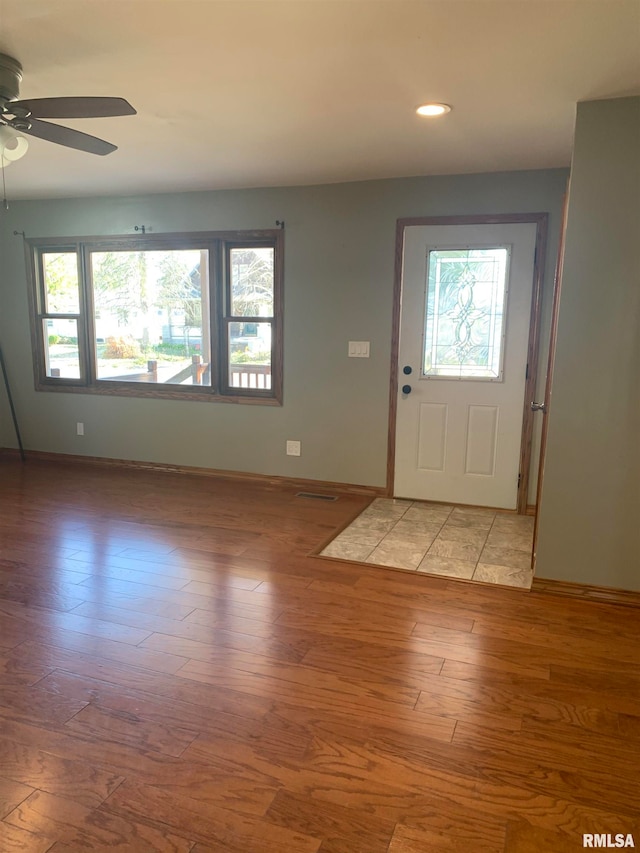 foyer entrance featuring light hardwood / wood-style flooring and plenty of natural light