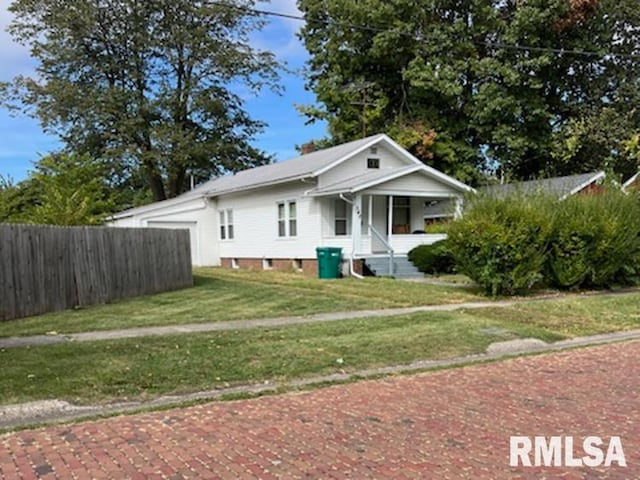 view of front of home with a front yard