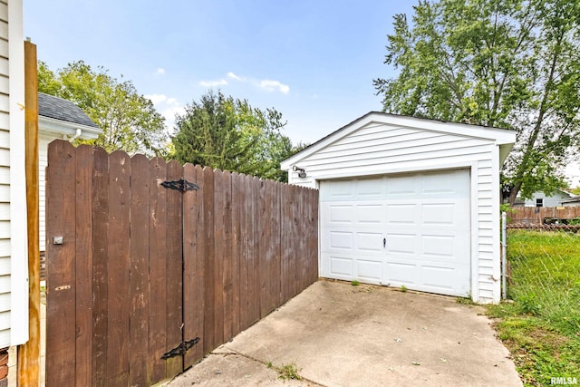 garage featuring wood walls