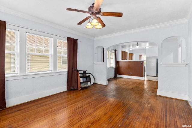 unfurnished living room featuring ornamental molding, hardwood / wood-style floors, and ceiling fan