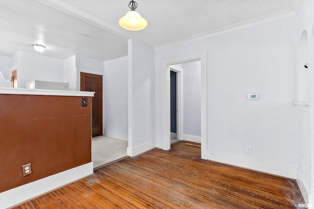 spare room with hardwood / wood-style floors