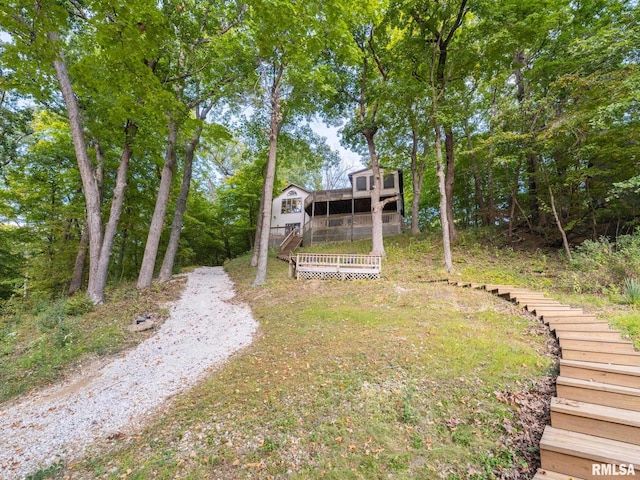 view of yard featuring a deck