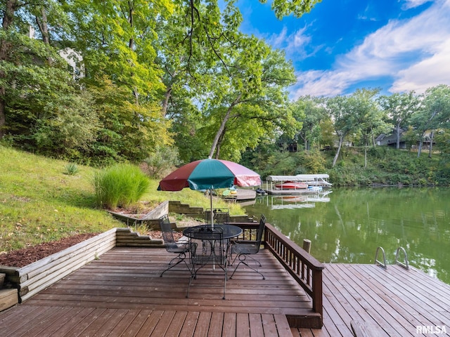 view of dock with a water view