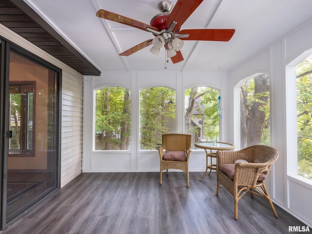 sunroom / solarium with ceiling fan and a healthy amount of sunlight