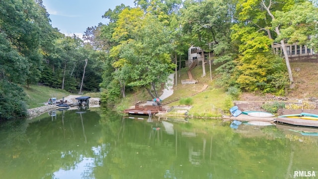 dock area featuring a water view