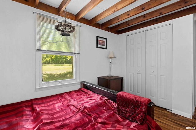 913 E Truitt Ave, Chillicothe, IL 61523 - bedroom featuring a chandelier, beamed ceiling, and wood finished floors