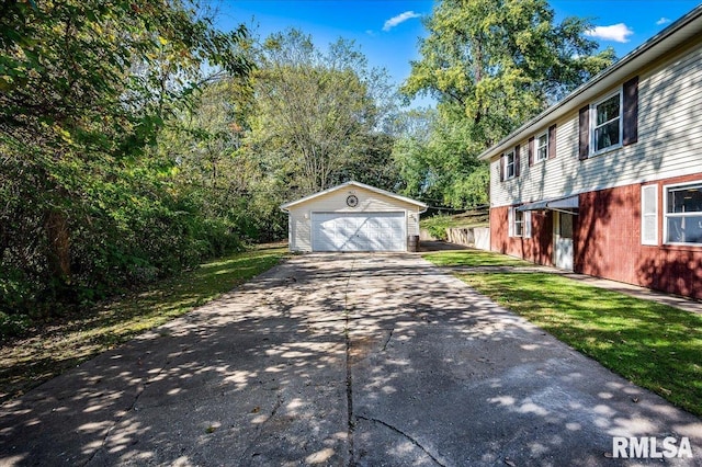 exterior space featuring an outdoor structure and a garage