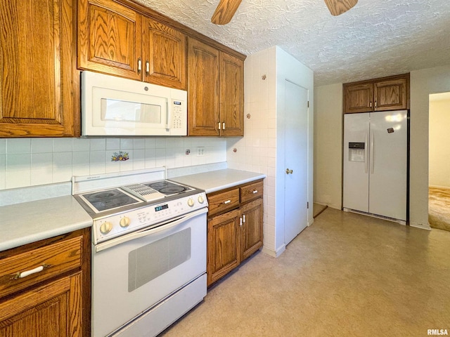 kitchen with a textured ceiling, white appliances, ceiling fan, and tasteful backsplash