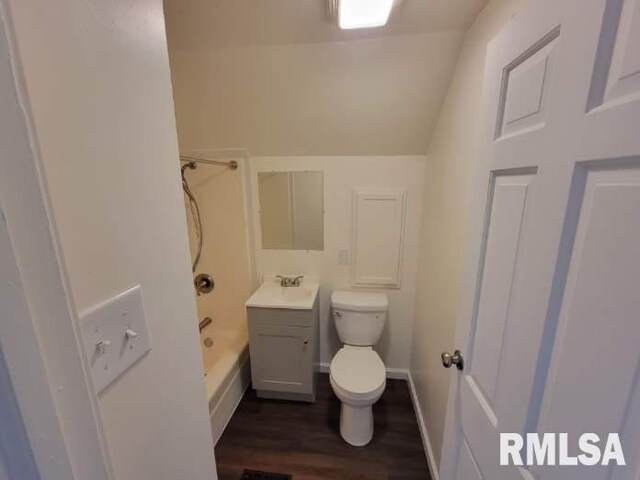 bathroom with wood-type flooring and a shower with door