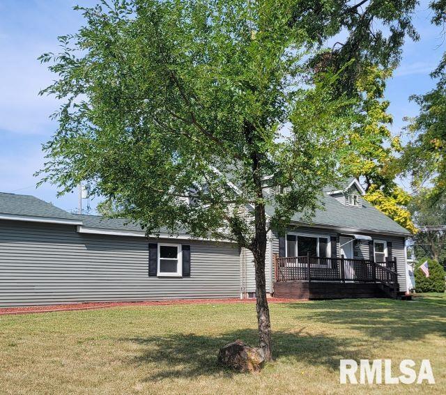 exterior space featuring a yard and a deck