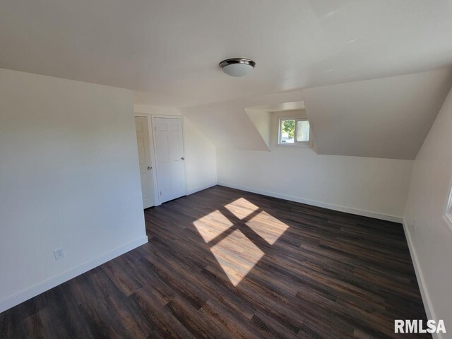 unfurnished room featuring dark hardwood / wood-style floors