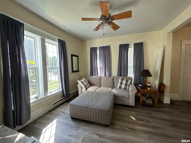 living room featuring hardwood / wood-style floors and ceiling fan