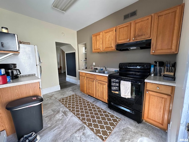 kitchen featuring black range with electric cooktop and sink